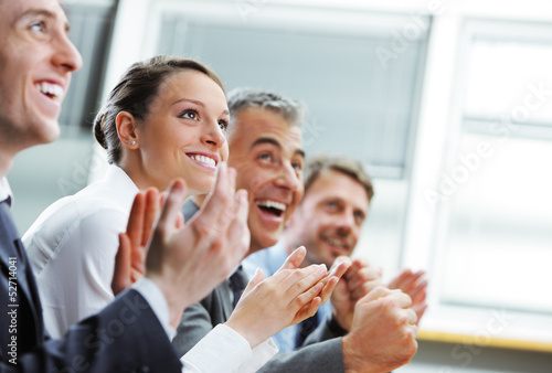 Photo: Clapping business people Clapping business people