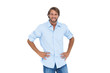 Handsome man smiling with his hands on hips