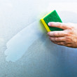 Cleaning car using a cleaning sponge