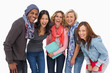 Fashionable students in a row smiling