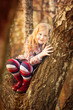 Foto: happy girl in autumn forest happy girl in autumn forest