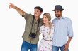 Photographer pointing to something with friends