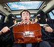 Photo: businessman grasped in hostages. businessman grasped in hostages.