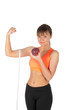 Young woman after fitness time and exercising with apple