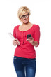 Fashion female using mobile phone and holding digital tablet