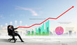 Businessman pulling graph