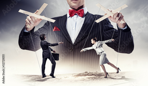 Photo: Businessman puppeteer Businessman puppeteer