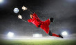 Goalkeeper catches the ball