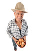 a farmer man holds eggs