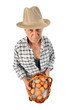 a farmer man holds eggs