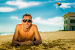 sexy young man at the beach