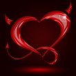 red heart with tail and horns on black background