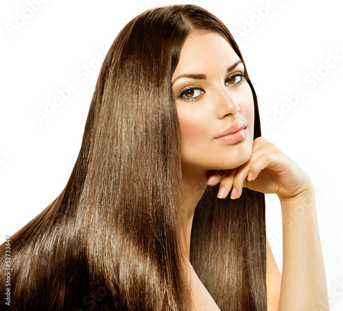 Photo: Long Straight Hair. Beautiful Brunette Girl isolated on white Long Straight Hair. Beautiful Brunette Girl isolated on white