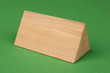 wooden geometric shapes on a green background
