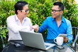 Asian Businessmen working outdoor