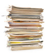 Stack of old magazines isolated on white. Paper recycling