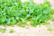 Chopped chives on wooden board