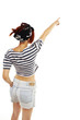 Beautiful young woman looking at wall. Rear view