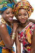 Photo: Two African fashion models on white background. Two African fashion models on white background.