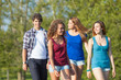 Group of Teenage Friends Walking at Park