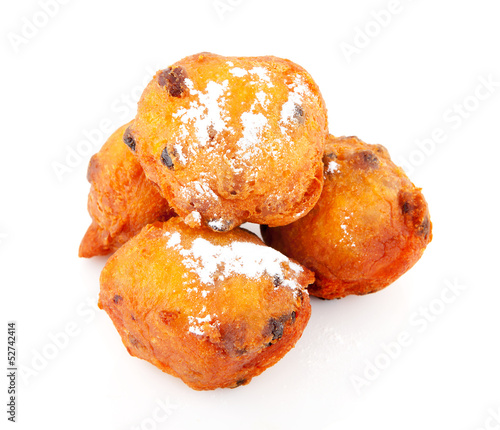 Photo: pile of Dutch donut also known as oliebollen pile of Dutch donut also known as oliebollen