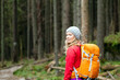Woman hiking in forest