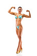 Photo: beautiful athletic girl wearing bikini posing over white beautiful athletic girl wearing bikini posing over white