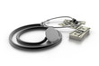 medical stethoscope and dollars