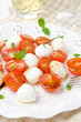 salad with mini mozzarella, cherry tomatoes and fresh basil
