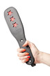 Photo: black leather fetish paddle in female hand isolated on white bac black leather fetish paddle in female hand isolated on white bac