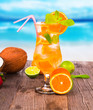 Summer drink with blur beach on background