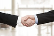 Foto: Close up of business handshake Close up of business handshake