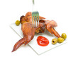 smoked wings, tomato ketchup and olives on a plate