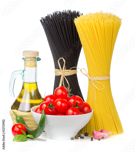 Photo: Italian food - spaghetti, tomatoes, basil, olive oil, garlic an Italian food - spaghetti, tomatoes, basil, olive oil, garlic an