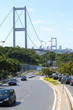 Photo: Landscape with wide road and cars Landscape with wide road and cars