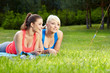 Photo: Portrait of two fitness woman having fun in summer environment Portrait of two fitness woman having fun in summer environment