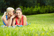 Photo: Portrait of two fitness woman having fun in summer environment Portrait of two fitness woman having fun in summer environment