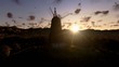 Wind Mill and time lapse clouds at sunset, zoom out