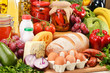 Assorted grocery products including vegetables fruits wine bread