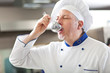 Chef tasting soup