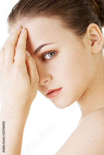 Photo: Beautiful woman's face with fresh clean skin Beautiful woman's face with fresh clean skin