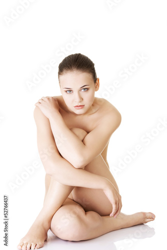 Photo: Sexy fit naked woman with healthy clean skin Sexy fit naked woman with healthy clean skin