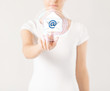 woman pressing virtual button with e-mail icon