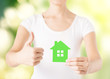 woman hands holding green house