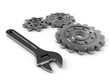 steel gear and wrench tool on a white background