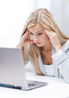 stressed woman with laptop