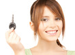 Photo: happy girl with car key happy girl with car key