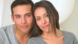 Happy Mexican couple smiling