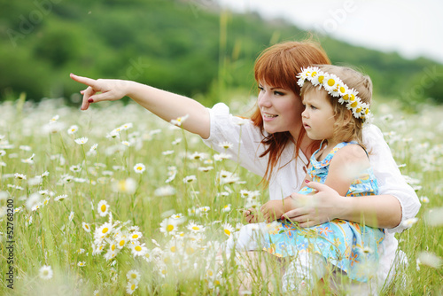 Photo: happy family in daisy field happy family in daisy field
