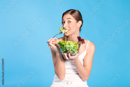 Photo: Healthy nutrition - young woman with salad Healthy nutrition - young woman with salad